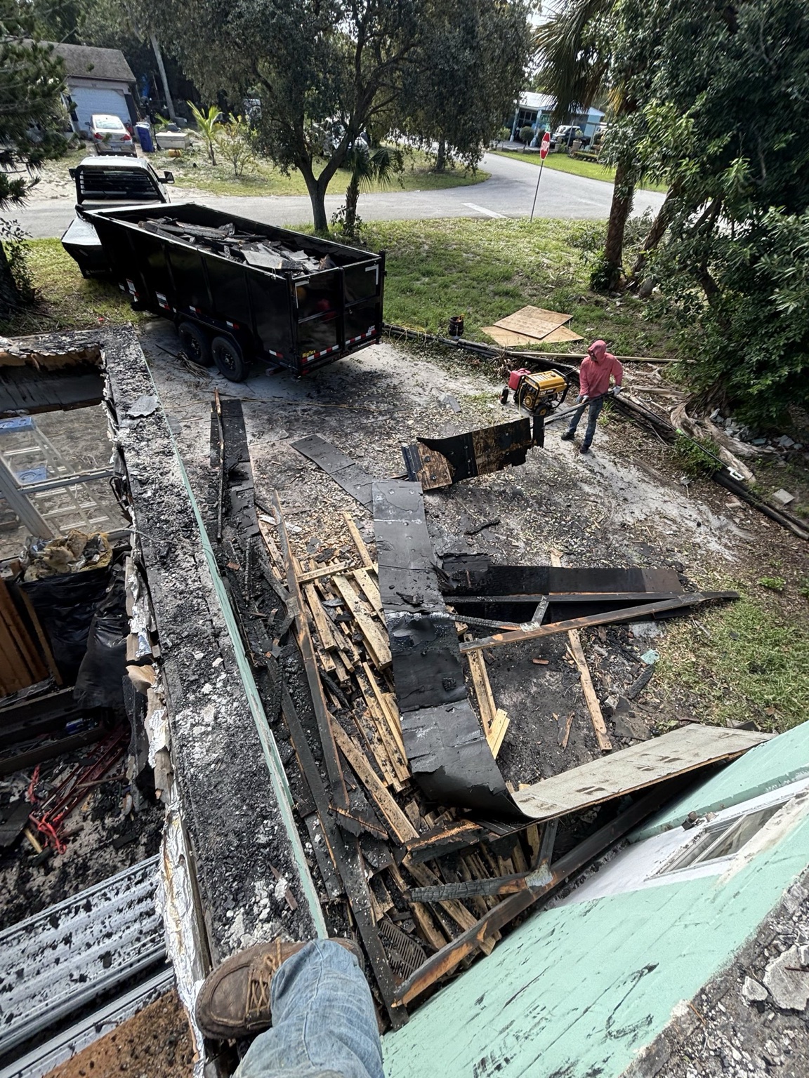 Demolition cleanup with dump trailer